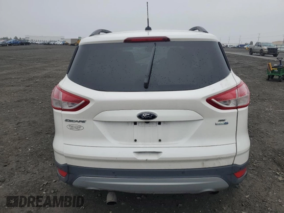 2016 Ford Escape SE with VIN 1FMCU9GX6GUA22334, listed as a Copart auction lot 51315075 with 112,778 mi miles and Salvage Title. Bid and sale history available at DreamBid. Image 6.
