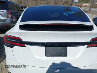 2023 Tesla Model X with VIN 7SAXCDE54PF430808, listed as a IAAI auction lot 41667924 with 21,100 mi miles and . Bid and sale history available at DreamBid. Image 16.