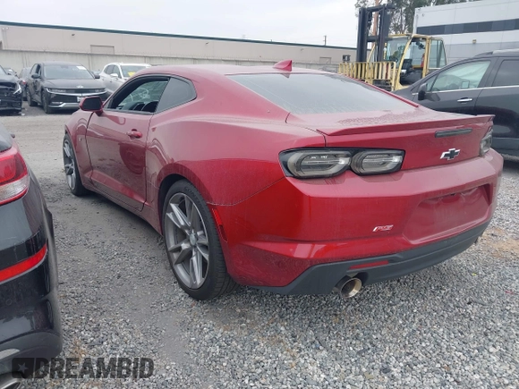 2021 Chevrolet Camaro 1LT with VIN 1G1FB1RX9M0107010, listed as a IAAI auction lot 42629591 with 65,450 mi miles and . Bid and sale history available at DreamBid. Image 3.