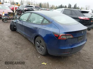 2023 Tesla Model 3 Long Range with VIN 5YJ3E1EB5PF704463, listed as a IAAI auction lot 41916627 with 14,305 mi miles and . Bid and sale history available at DreamBid. Image 3.