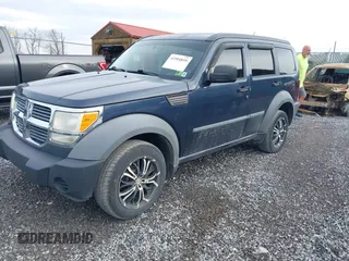 2008 Dodge Nitro SXT with VIN 1D8GU28K18W165005, listed as a IAAI auction lot 41904859 with 171,029 mi miles. Bid and sale history available at carsss.com. Image 2.