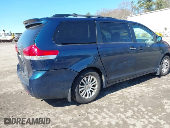 2011 Toyota Sienna XLE AAS with VIN 5TDYK3DCXBS114882, listed as a IAAI auction lot 42007417 with 144,087 mi miles and . Bid and sale history available at DreamBid. Image 4.
