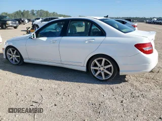 2014 Mercedes-Benz C 250 Sport with VIN WDDGF4HB5EA962960, listed as a Copart auction lot 62601655 with 34,620 mi miles and Salvage title. Bid and sale history available at DreamBid. Image 2.