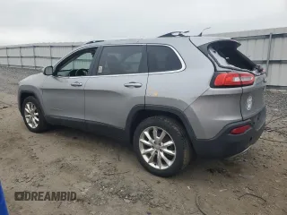 2014 Jeep Cherokee Limited with VIN 1C4PJLDS0EW241327, listed as a Copart auction lot 59440245 with 73,623 mi miles and Salvage title. Bid and sale history available at DreamBid. Image 2.
