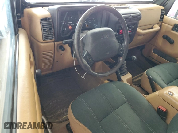 1998 Jeep Wrangler Sahara z VIN 1J4FY49S4WP728476, wystawiony jako Copart lot #53490515 z przebiegiem 272 058 mil mil oraz Czysty tytuł • Clean title. Historia ofert i sprzedaży dostępna na DreamBid. Obrazek 8.