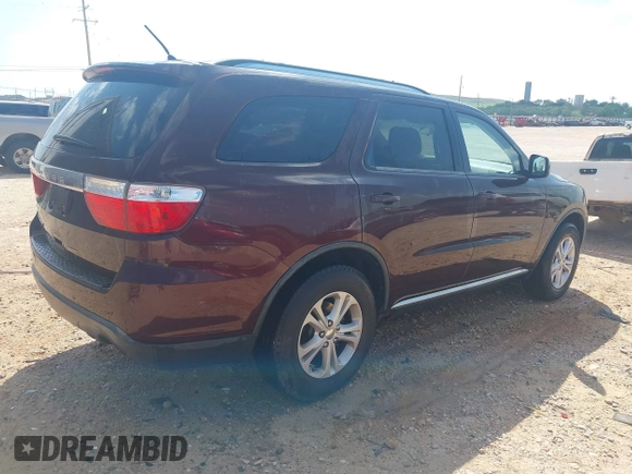 2012 Dodge Durango SXT with VIN 1C4RDHAG8CC361176, listed as a IAAI auction lot 42643631 with 201,419 mi miles and . Bid and sale history available at DreamBid. Image 4.