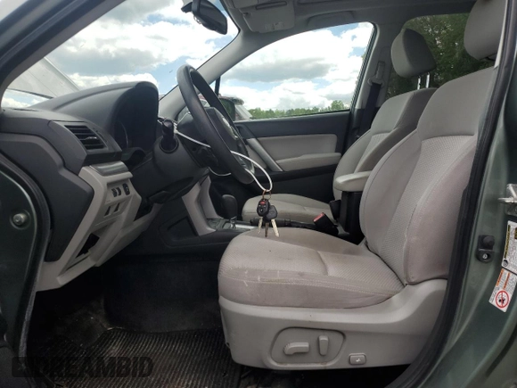 2014 Subaru Forester Premium with VIN JF2SJAEC0EH447775, listed as a Copart auction lot 56037295 with 136,318 mi miles and Clean Title. Bid and sale history available at DreamBid. Image 7.