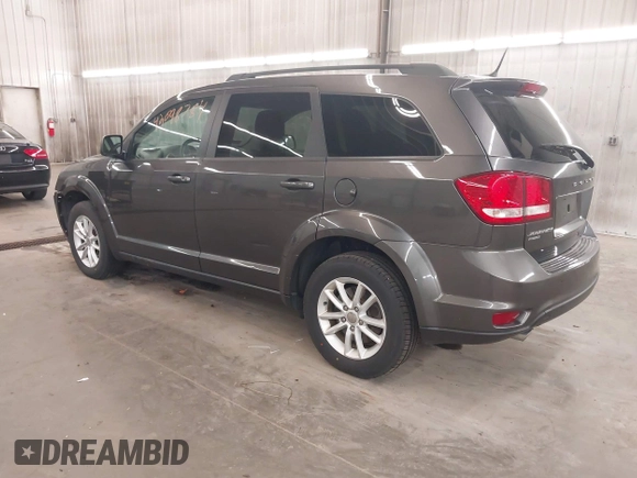 2017 Dodge Journey SXT with VIN 3C4PDDBG1HT512398, listed as a IAAI auction lot 42098784 with 123,946 mi miles and . Bid and sale history available at DreamBid. Image 3.