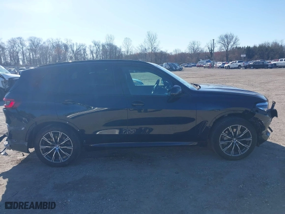 2021 BMW X5 xDrive40i with VIN 5UXCR6C09M9F83785, listed as a IAAI auction lot 41828697 with 57,863 mi miles. Bid and sale history available at carsss.com. Image 13.