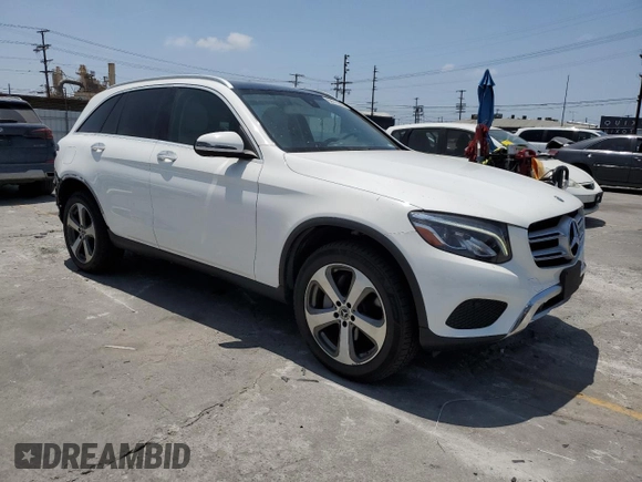 2019 Mercedes-Benz GLC 300 with VIN WDC0G4JB5KF614670, listed as a Copart auction lot 62017055 with 56,575 mi miles and Salvage title. Bid and sale history available at DreamBid. Image 4.