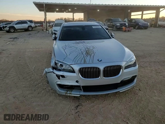 2012 BMW 7 Series 740Li with VIN WBAKB4C50CC576043, listed as a Copart auction lot 42060065 with 142,017 mi miles and Salvage Title. Bid and sale history available at carsss.com. Image 13.