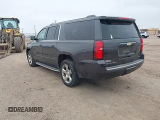 2017 Chevrolet Suburban Premier with VIN 1GNSKJKC3HR201180, listed as a IAAI auction lot 41516652 with Not Provided miles and . Bid and sale history available at DreamBid. Image 3.