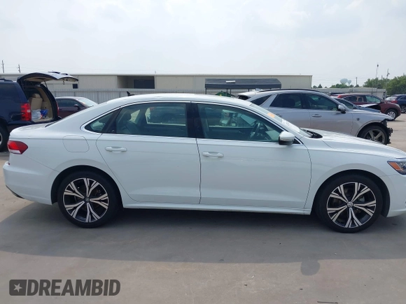 2021 Volkswagen Passat SE z VIN 1VWSA7A32MC014376, wystawiony jako IAAI lot #42314372 z przebiegiem 81 209 mil mil oraz . Historia ofert i sprzedaży dostępna na DreamBid. Obrazek 13.