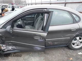 2004 Ford Taurus SE with VIN 1FAFP53254A204492, listed as a IAAI auction lot 41543153 with 70,395 mi miles and . Bid and sale history available at DreamBid. Image 12.