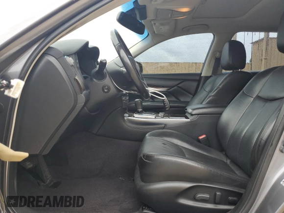 2015 Infiniti Q70 z VIN JN1BY1PR6FM831034, wystawiony jako Copart lot #51889835 z przebiegiem 128 220 mil mil oraz Szkoda całkowita • Salvage title. Historia ofert i sprzedaży dostępna na DreamBid. Obrazek 7.