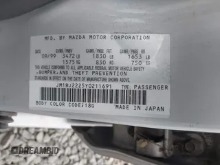 2000 Mazda Protege DX z VIN JM1BJ2225Y0211691, wystawiony jako IAAI lot #42464257 z przebiegiem 176 457 mil mil oraz . Historia ofert i sprzedaży dostępna na DreamBid. Obrazek 9.