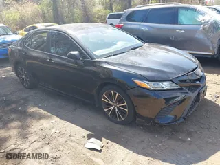 2018 Toyota Camry LE with VIN 4T1B11HK9JU115557, listed as a IAAI auction lot 42087452 with 185,752 mi miles. Bid and sale history available at carsss.com. Image 1.