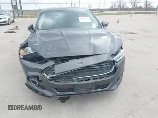 2015 Ford Fusion Titanium with VIN 3FA6P0K95FR181919, listed as a IAAI auction lot 41744443 with 127,572 mi miles. Bid and sale history available at carsss.com. Image 6.