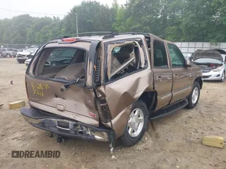 2004 GMC Yukon SLT z VIN 1GKEK13Z44R121720, wystawiony jako IAAI lot #42222492 z przebiegiem 263 216 mil mil oraz . Historia ofert i sprzedaży dostępna na DreamBid. Obrazek 6.