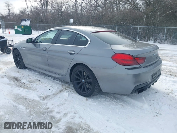 2013 BMW 6 Series 650i xDrive with VIN WBA6B4C54DDG67543, listed as a IAAI auction lot 41607681 with 74,101 mi miles. Bid and sale history available at carsss.com. Image 3.