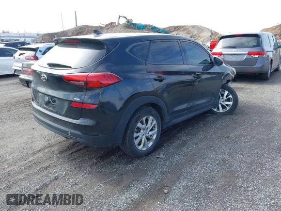 2019 Hyundai Tucson SE with VIN KM8J2CA46KU977863, listed as a IAAI auction lot 41704318 with 23,076 mi miles. Bid and sale history available at carsss.com. Image 4.