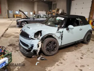2014 MINI Convertible S with VIN WMWZP3C59ET707581, listed as a Copart auction lot 46983865 with 42,746 mi miles and Salvage Title. Bid and sale history available at DreamBid. Image 1.