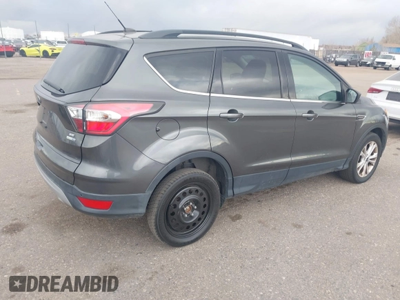 2017 Ford Escape SE with VIN 1FMCU9GD1HUB46034, listed as a IAAI auction lot 41840906 with 143,806 mi miles. Bid and sale history available at carsss.com. Image 4.
