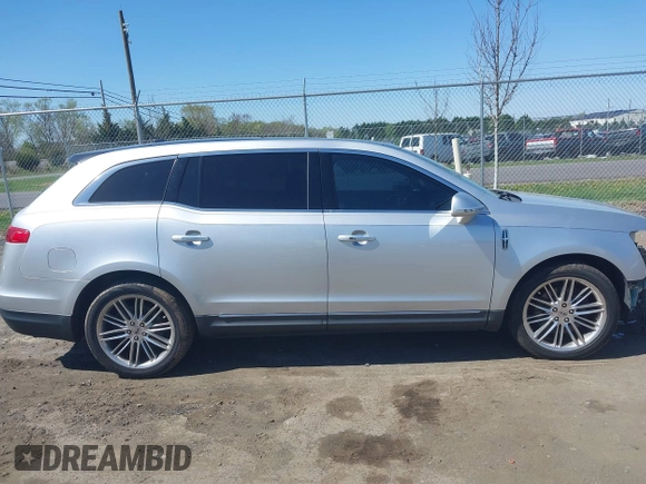 2015 Lincoln MKT EcoBoost with VIN 2LMHJ5AT4FBL00959, listed as a IAAI auction lot 41991763 with 159,687 mi miles and . Bid and sale history available at DreamBid. Image 13.