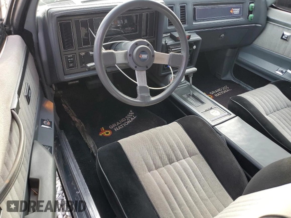 1987 Buick Regal with VIN 1G4GJ1174HP443571, listed as a Copart auction lot 83341634 with 53,709 mi miles and Salvage Title. Bid and sale history available at DreamBid. Image 8.