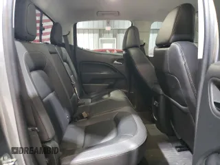 2022 GMC Canyon 4WD AT4 w/Leather with VIN 1GTG6FEN1N1175900, listed as a Copart auction lot 85957514 with 56,811 mi miles and Salvage Title. Bid and sale history available at carsss.com. Image 10.