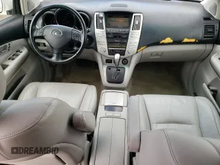 2006 Lexus RX 400h with VIN JTJHW31UX60023361, listed as a Copart auction lot 60489355 with 112,087 mi miles and Salvage title. Bid and sale history available at DreamBid. Image 8.