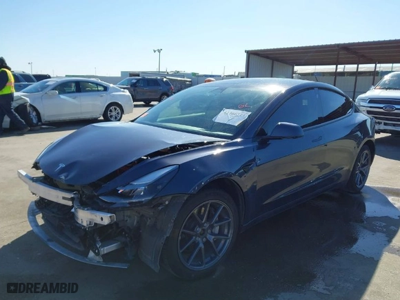 2022 Tesla Model 3 Long Range with VIN 5YJ3E1EB9NF197127, listed as a IAAI auction lot 41366323 with 56,559 mi miles. Bid and sale history available at carsss.com. Image 2.