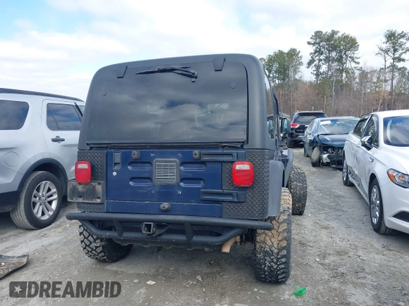 2006 Jeep Wrangler Sport with VIN 1J4FA49S66P732419, listed as a IAAI auction lot 41607851 with 120,099 mi miles. Bid and sale history available at carsss.com. Image 16.