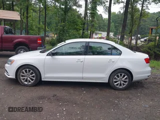 2015 Volkswagen Jetta SE with VIN 3VWD17AJ7FM292814, listed as a IAAI auction lot 42636431 with 105,416 mi miles and . Bid and sale history available at DreamBid. Image 14.