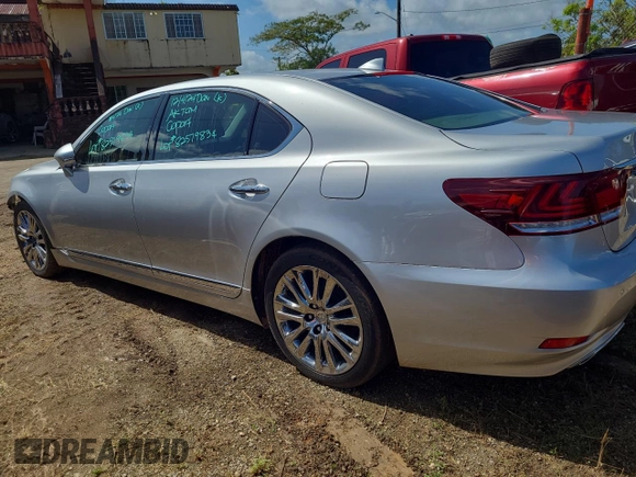 2015 Lexus LS 460 L with VIN JTHGL5EFXF5055498, listed as a Copart auction lot 82579834 with 112,465 mi miles and Salvage title. Bid and sale history available at DreamBid. Image 2.