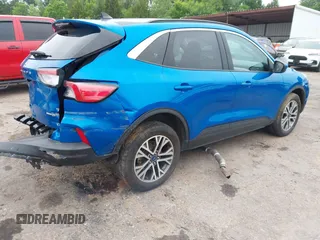 2021 Ford Escape SEL z VIN 1FMCU9H6XMUA63812, wystawiony jako IAAI lot #42418390 z przebiegiem 88 263 mil mil oraz . Historia ofert i sprzedaży dostępna na DreamBid. Obrazek 4.