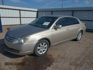 2007 Toyota Avalon XL z VIN 4T1BK36B97U233967, wystawiony jako IAAI lot #42501668 z przebiegiem 143 480 mil mil oraz . Historia ofert i sprzedaży dostępna na DreamBid. Obrazek 2.