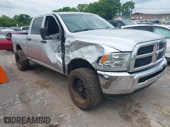 2012 Ram 2500 ST with VIN 3C6UD5CL5CG334735, listed as a IAAI auction lot 42439552 with 155,548 mi miles and . Bid and sale history available at DreamBid. Image 1.