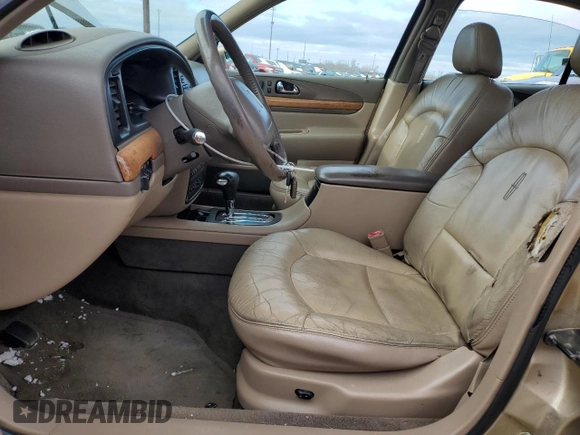 1999 Lincoln Continental with VIN 1LNHM97V2XY644250, listed as a Copart auction lot 82440454 with 196,568 mi miles and Clean Title. Bid and sale history available at carsss.com. Image 7.