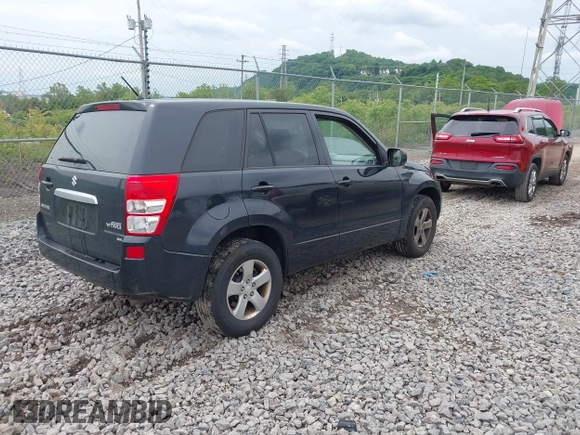 2012 Suzuki Grand Vitara Premium z VIN JS3TD0D6XC4100539, wystawiony jako IAAI lot #42384659 z przebiegiem 143 711 mil mil oraz . Historia ofert i sprzedaży dostępna na DreamBid. Obrazek 4.