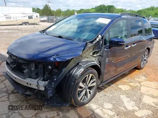 2022 Honda Odyssey Touring with VIN 5FNRL6H86NB004865, listed as a IAAI auction lot 42254009 with 47,229 mi miles and . Bid and sale history available at DreamBid. Image 2.