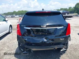 2018 Cadillac XT5 Premium Luxury AWD z VIN 1GYKNFRS3JZ112459, wystawiony jako IAAI lot #42590258 z przebiegiem 157 377 mil mil oraz . Historia ofert i sprzedaży dostępna na DreamBid. Obrazek 16.
