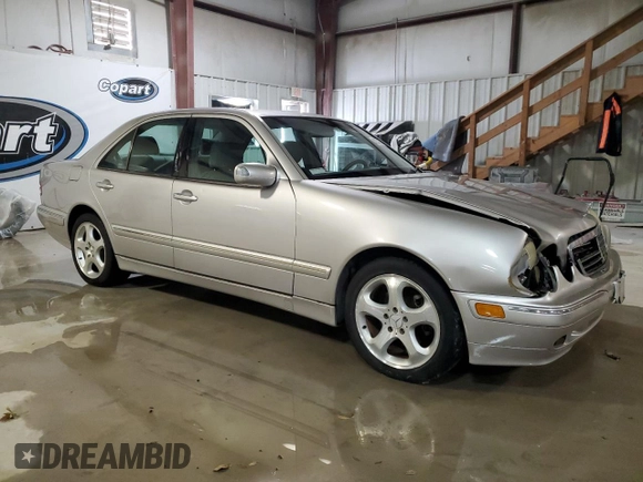 2002 Mercedes-Benz E 320 with VIN WDBJF65J52B497463, listed as a Copart auction lot 82372014 with 201,131 mi miles and Salvage Title. Bid and sale history available at DreamBid. Image 4.
