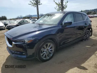 2021 Mazda CX-5 Grand Touring with VIN JM3KFBDM2M0494679, listed as a Copart auction lot 50017675 with 25,965 mi miles and Salvage Title. Bid and sale history available at carsss.com. Image 1.