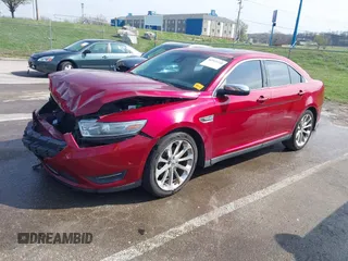 2013 Ford Taurus Limited with VIN 1FAHP2F84DG127859, listed as a IAAI auction lot 41913310 with 196,620 mi miles and . Bid and sale history available at DreamBid. Image 18.