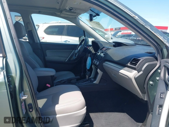 2016 Subaru Forester Touring with VIN JF2SJAVCXGH490507, listed as a IAAI auction lot 42070715 with 98,456 mi miles and . Bid and sale history available at DreamBid. Image 5.