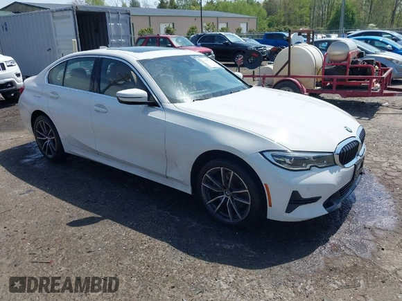2019 BMW 3 Series 330i xDrive with VIN WBA5R7C54KAJ79214, listed as a IAAI auction lot 42001361 with 103,265 mi miles. Bid and sale history available at carsss.com. Image 1.