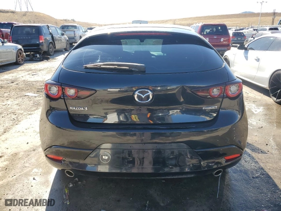 2022 Mazda Mazda3 Hatchback Select with VIN JM1BPAKL1N1502616, listed as a Copart auction lot 43906965 with 59,669 mi miles and Salvage Title. Bid and sale history available at carsss.com. Image 6.