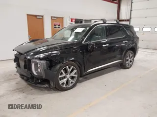 2021 Hyundai Palisade Limited z VIN KM8R5DHE7MU245923, wystawiony jako IAAI lot #42091365 z przebiegiem 100 565 mil mil oraz . Historia ofert i sprzedaży dostępna na DreamBid. Obrazek 2.
