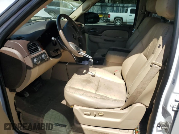 2012 Chevrolet Suburban LT with VIN 1GNSKJE78CR190877, listed as a Copart auction lot 48389835 with 191,045 mi miles and Salvage title. Bid and sale history available at DreamBid. Image 7.